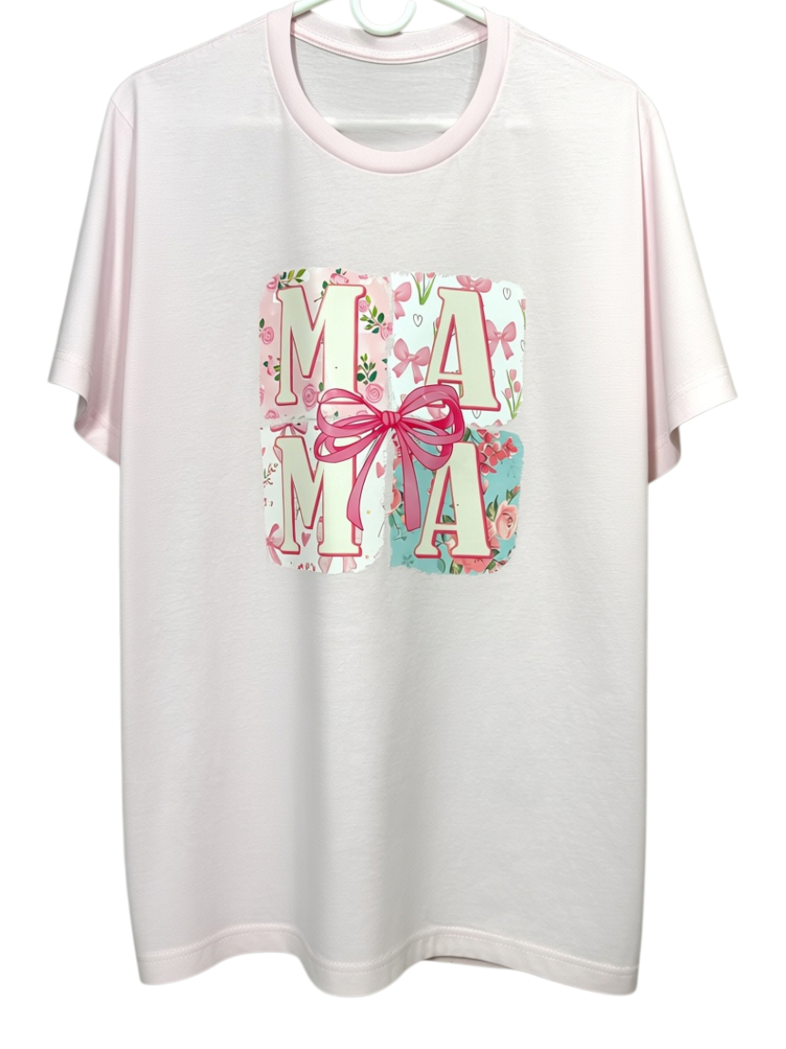 Zia Rose Boutique light pink crew neck t-shirt featuring a square MAMA graphic with floral patterns and a pink bow.