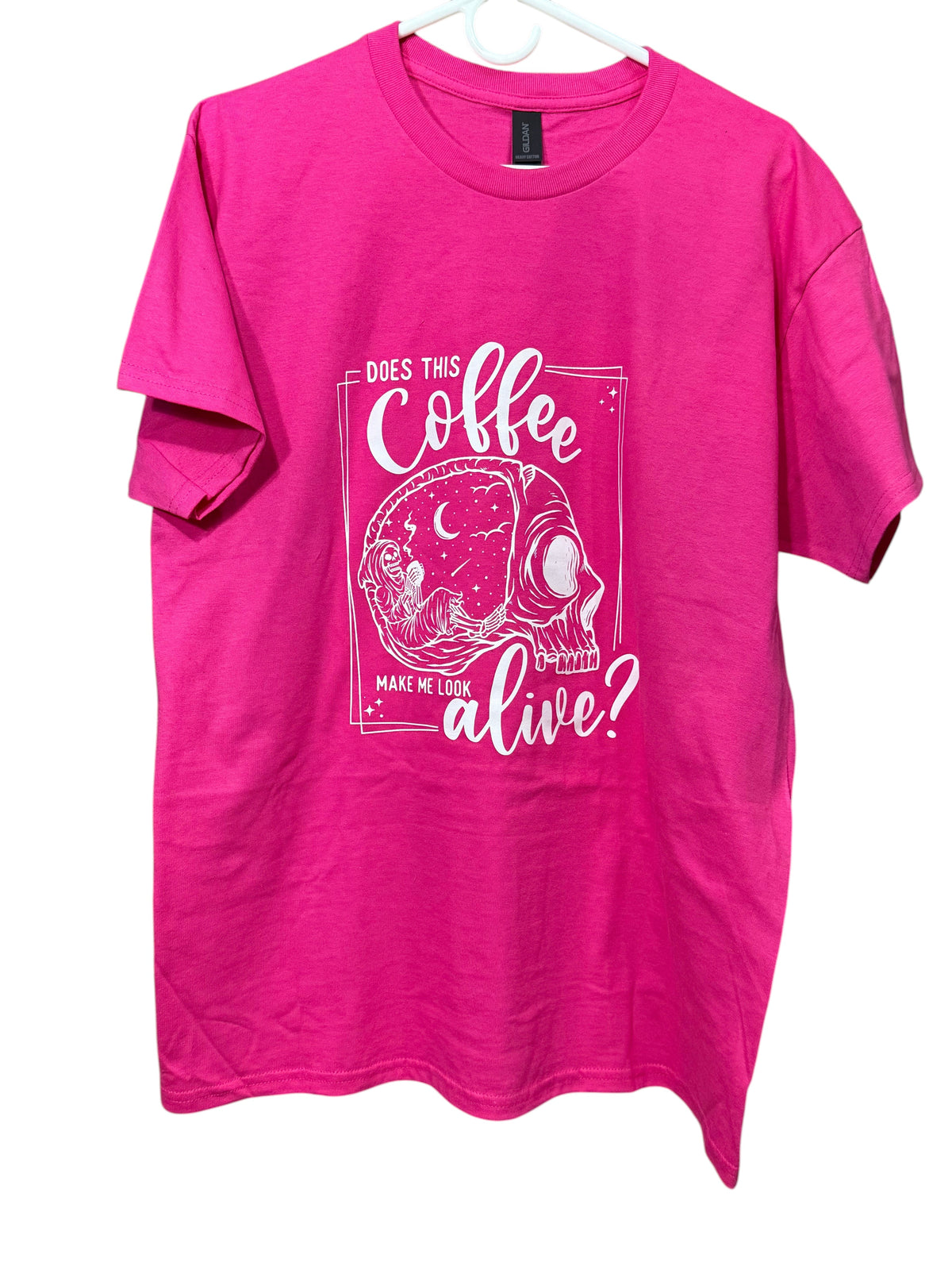 Zia Rose Boutique hot pink short sleeve cotton t-shirt with a white skull graphic and coffee quote