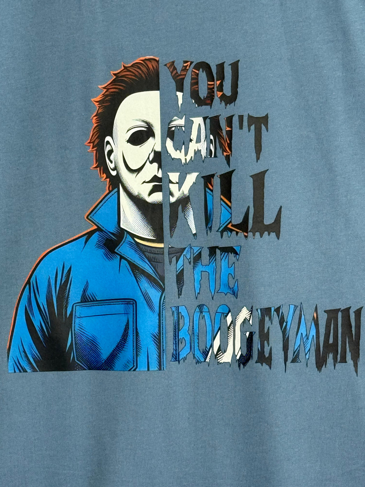 Zia Rose Boutique blue cotton t-shirt featuring a Michael Myers graphic and You Can't Kill the Boogeyman text